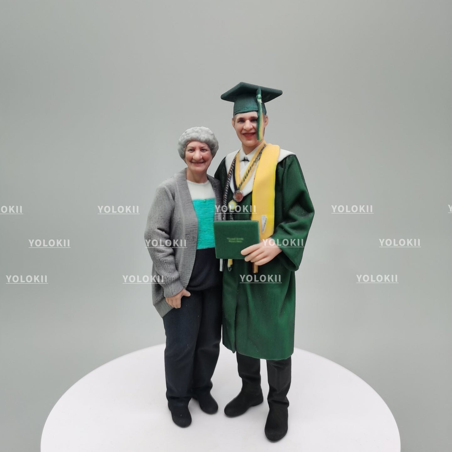 graduation figurine